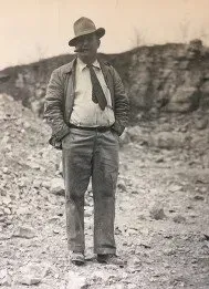W. T. Liter standing on the quarry floor, 1953